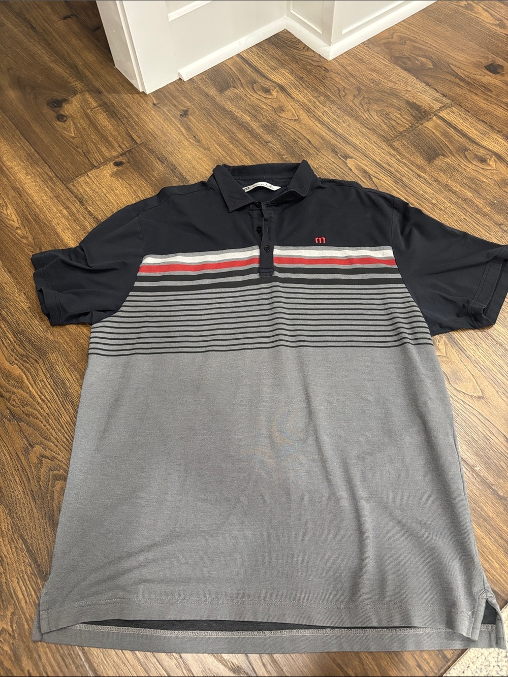 TravisMathew Men's Black & Gray Polo with Red Stripe